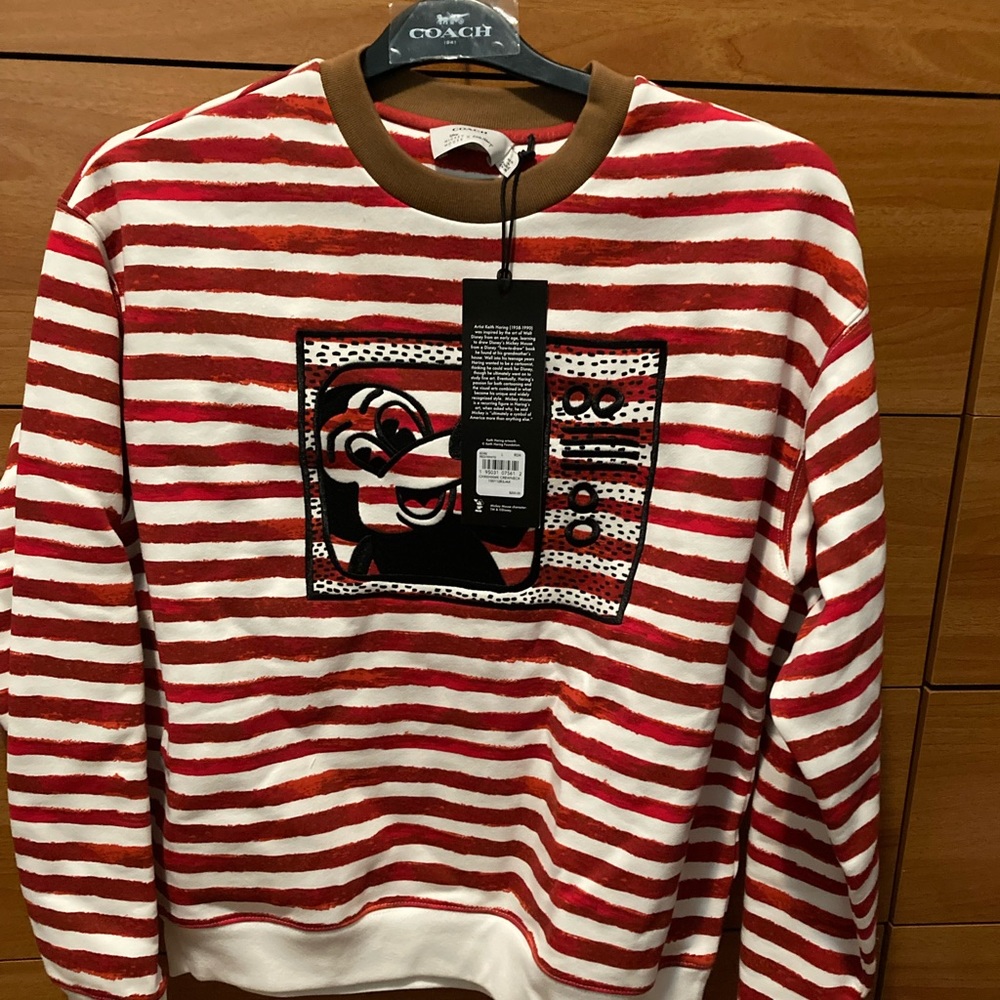 Coach long sleeve shirt inspired by the artwork by Keith Haring.